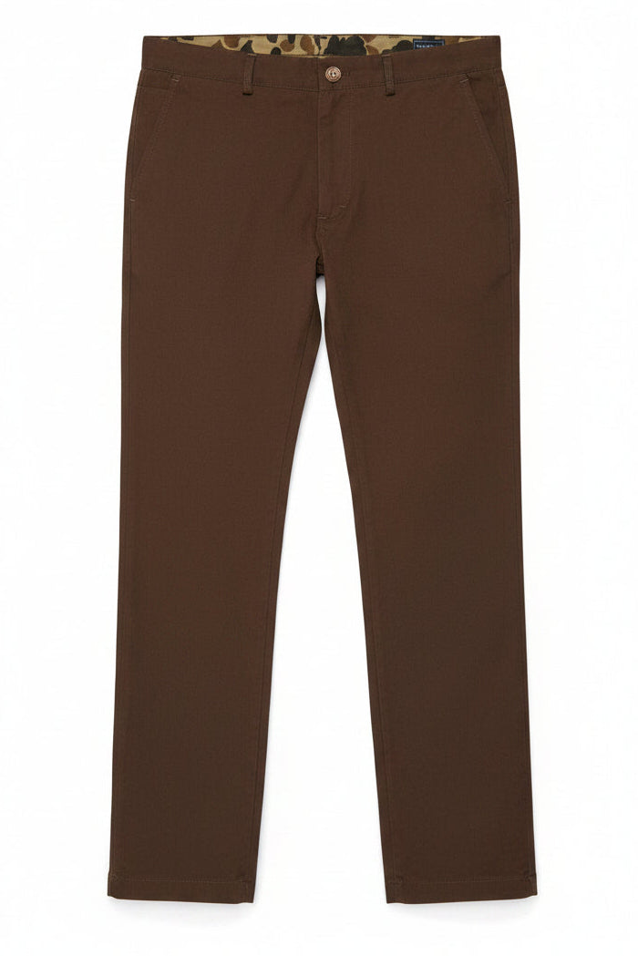 A pair of brown Heritage Pants made from Duck Cotton Canvas, featuring a tailored fit and bar tack stitching at high stress points.